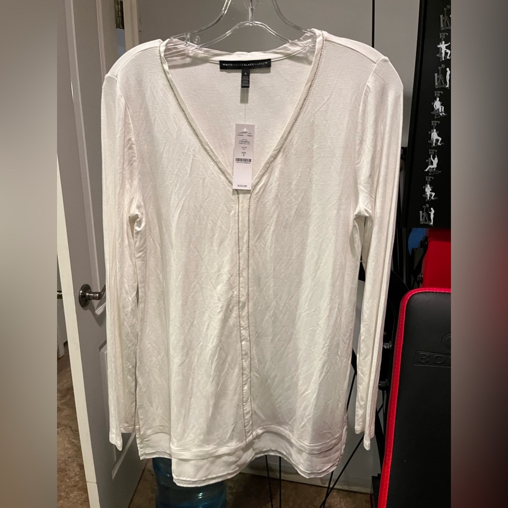 White House Black Market long sleeve top. Silver trim and lace bottom.